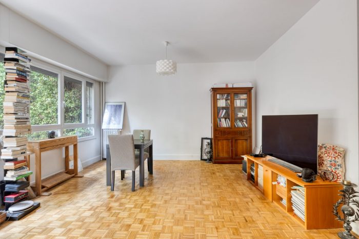 Living room with TV area and display cabinet
